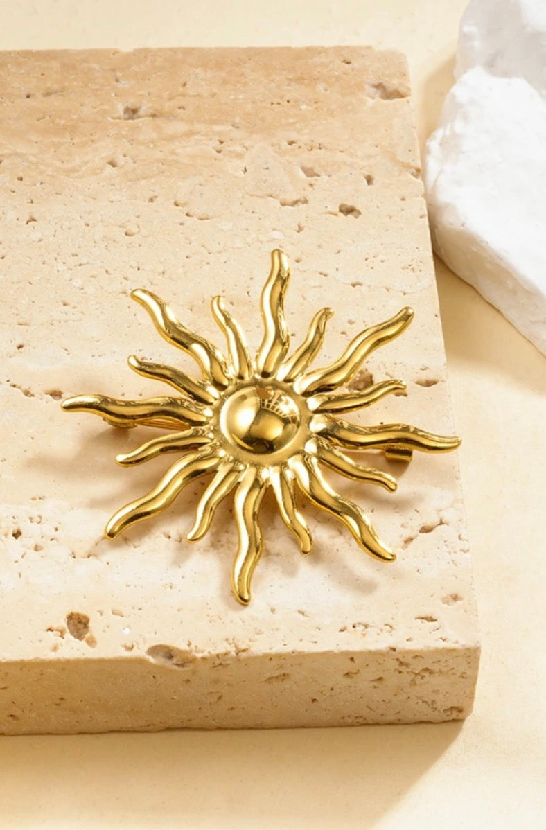 Broche soleil